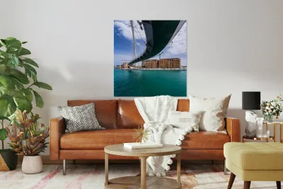 Modern apartments alongside Dubai Canal under Tolerance bridge Reproduction