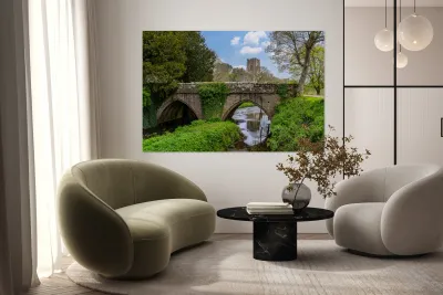Stone bridge at Fountains Abbey ruins in Yorkshire England Reproduction