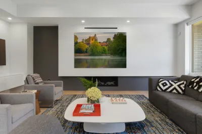 Sunset view across Ellesmere Mere in Shropshire to church Reproduction