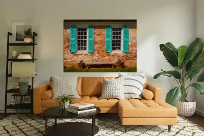 Painting of blue shutters against a white painted brick wall in  Reproduction