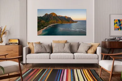 Aerial drone shot of Tunnels Beach at sunrise on Kauai in Hawaii Reproduction