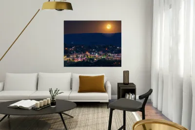 Supermoon rises in the sky above Morgantown in West Virginia Reproduction