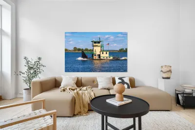 Tug boat or pusher boat leaving Lock and Dam 22 on Mississippi r Reproduction